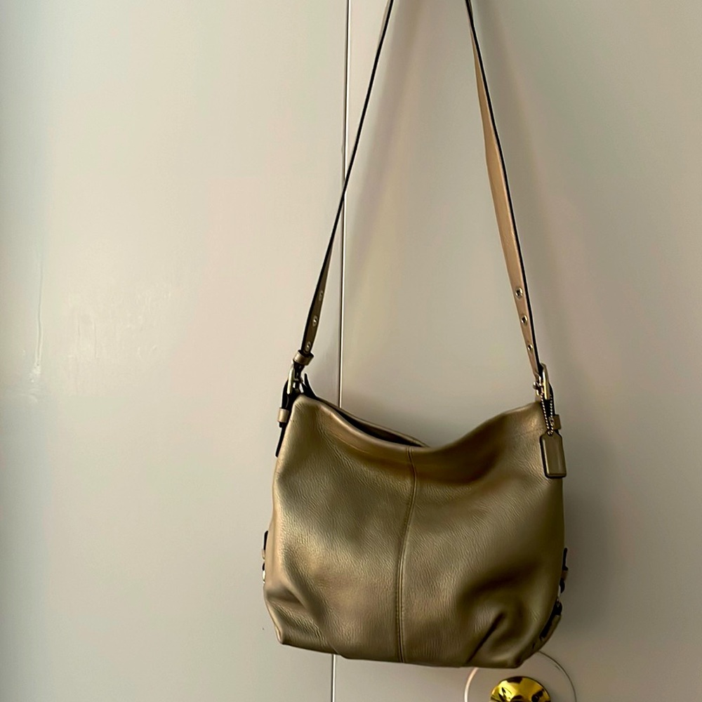 Coach Metallic Silver Duffel with Adjustable Strap. Perfect condition.